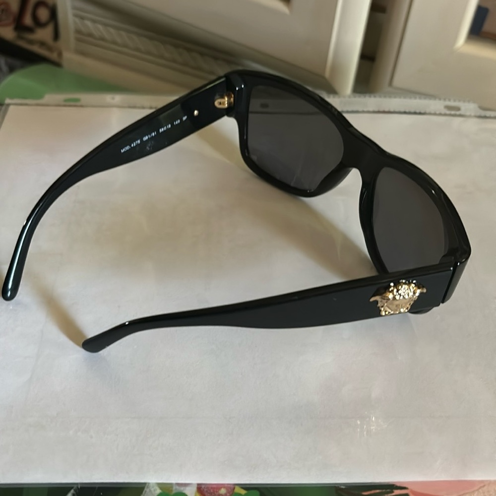 Used Versace sunglasses.